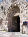 Zion Gate - Note the bullet holes and mosaic in the street