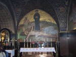 To the right of the Mosaic,  and up a long flight of stairs are multiple alters and a marker for the remembered place of Christ's crucifiction.