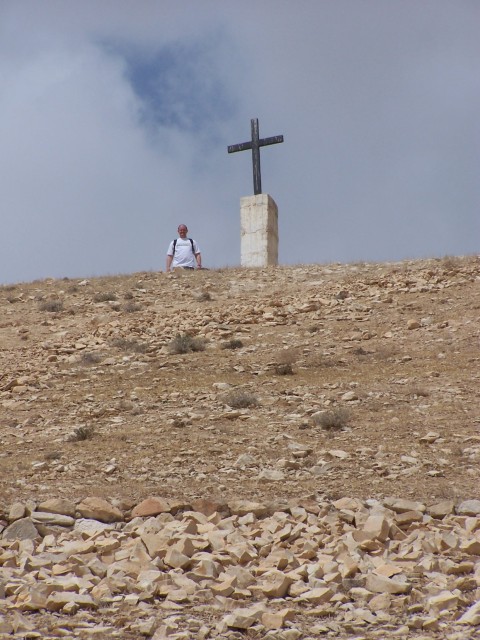 Wadi Qilt - This cross was UP the wadi from our bus,  but my roomie Jon went to the top,  and here is the proof.