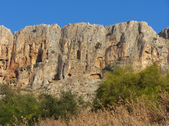 Mt Arbel - cliffs with caves.  Herod is said to have killed off zealots that were living in these caves,  by dropping roman solders over the edge in a basket.