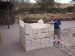 Jonathan clutching the stone alter